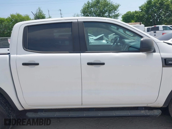 2023 Ford Ranger XL with VIN 1FTER4EH1PLE28153, listed as a IAAI auction lot 41955328 with 16,885 mi miles and . Bid and sale history available at DreamBid. Image 13.