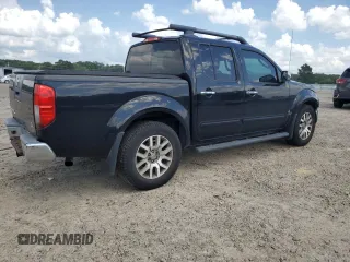 2011 Nissan Frontier SL with VIN 1N6AD0ERXBC440046, listed as a Copart auction lot 61645595 with 130,639 mi miles and Salvage title. Bid and sale history available at DreamBid. Image 3.