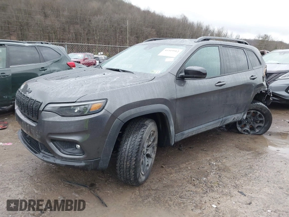 2022 Jeep Cherokee X with VIN 1C4PJMCX4ND525297, listed as a IAAI auction lot 41519912 with 42,691 mi miles. Bid and sale history available at carsss.com. Image 2.