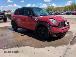 2015 MINI Countryman S with VIN WMWZC3C58FWT06695, listed as a Copart auction lot 56408325 with 99,673 mi miles and Salvage title. Bid and sale history available at DreamBid. Image 13.