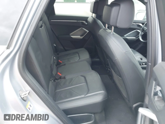 2021 Audi Q3 Premium with VIN WA1AUCF35M1131933, listed as a IAAI auction lot 41710739 with 93,293 mi miles and . Bid and sale history available at DreamBid. Image 8.