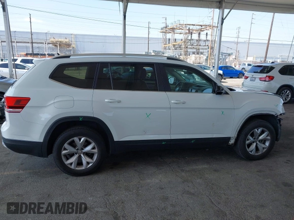 2018 Volkswagen Atlas SE with VIN 1V2CR2CAXJC594811, listed as a IAAI auction lot 42408595 with 65,247 mi miles and . Bid and sale history available at DreamBid. Image 14.