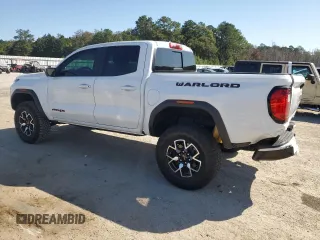 2023 GMC Canyon 4WD AT4X with VIN 1GTP6EEK6P1235222, listed as a Copart auction lot 75664684 with 9,736 mi miles and Salvage Title. Bid and sale history available at carsss.com. Image 2.