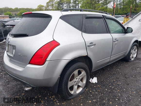 2003 Nissan Murano SE z VIN JN8AZ08W83W231298, wystawiony jako IAAI lot #42239796 z przebiegiem Nie podano mil oraz . Historia ofert i sprzedaży dostępna na DreamBid. Obrazek 4.