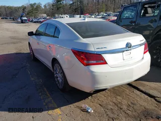 2014 Buick LaCrosse Premium II with VIN 1G4GF5G3XEF207781, listed as a IAAI auction lot 41661003 with 98,126 mi miles and . Bid and sale history available at DreamBid. Image 3.