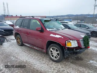 2006 GMC Envoy Denali with VIN 1GKET63M162337213, listed as a IAAI auction lot 41292801 with 133,201 mi miles. Bid and sale history available at carsss.com. Image 1.