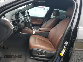 2017 BMW X6 sDrive35i with VIN 5UXKU0C34H0G69243, listed as a Copart auction lot 69607524 with 105,996 mi miles and Salvage Title. Bid and sale history available at carsss.com. Image 7.