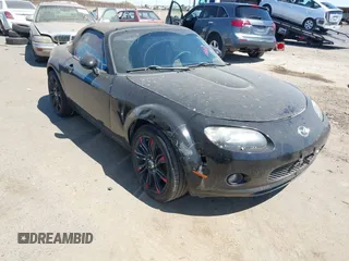 2006 Mazda MX-5 Miata Sport with VIN JM1NC25F860115878, listed as a IAAI auction lot 42842757 with 81,777 mi miles and . Bid and sale history available at DreamBid. Image 1.
