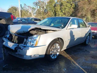2009 Cadillac DTS w/1SA with VIN 1G6KD57Y69U110856, listed as a IAAI auction lot 41369392 with 89,282 mi miles. Bid and sale history available at carsss.com. Image 2.