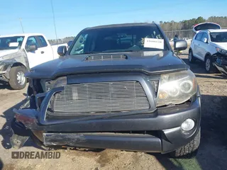 2009 Toyota Tacoma PreRunner with VIN 3TMJU62N09M079135, listed as a IAAI auction lot 41608120 with 230,384 mi miles. Bid and sale history available at carsss.com. Image 13.