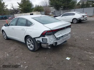 2023 Honda Accord Sedan LX with VIN 1HGCY1F27PA016061, listed as a IAAI auction lot 41293040 with 32,996 mi miles. Bid and sale history available at carsss.com. Image 3.