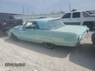 1961 Ford Thunderbird with VIN 1Y71Z144517, listed as a Copart auction lot 73210934 with 84,354 mi miles and Non Repairable. Bid and sale history available at DreamBid. Image 2.