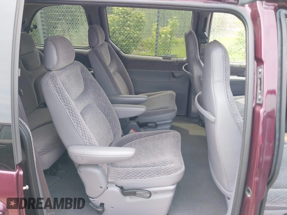 1999 Plymouth Voyager z VIN 2P4GP45G8XR219355, wystawiony jako IAAI lot #42482440 z przebiegiem 129 283 mil mil oraz . Historia ofert i sprzedaży dostępna na DreamBid. Obrazek 8.