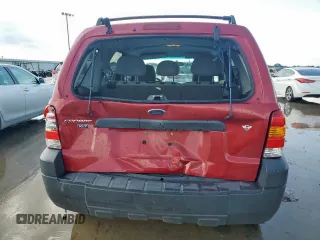 2006 Ford Escape XLT with VIN 1FMYU03196KA38458, listed as a Copart auction lot 64194705 with 102,097 mi miles and Salvage title. Bid and sale history available at DreamBid. Image 6.