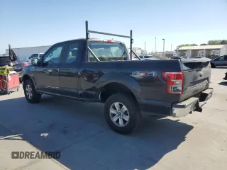 2018 Ford F-150 XL with VIN 1FTEX1EB2JKF61257, listed as a Copart auction lot 53674615 with 161,021 mi miles and Salvage title. Bid and sale history available at DreamBid. Image 2.