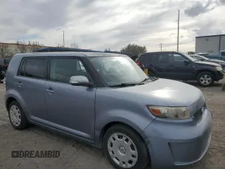 2010 Scion xB with VIN JTLZE4FE3A1100385, listed as a Copart auction lot 53754515 with 99,701 mi miles and Salvage Title. Bid and sale history available at DreamBid. Image 4.