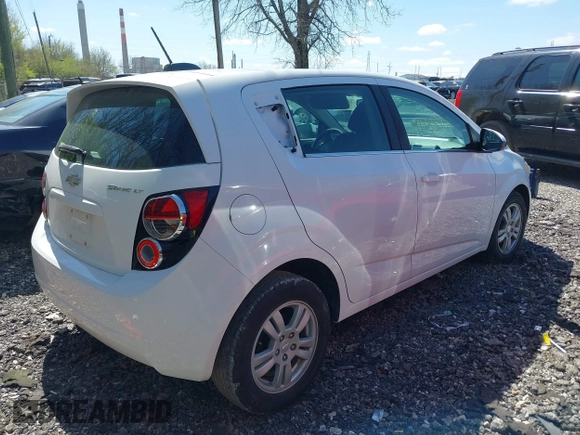 2016 Chevrolet Sonic LT with VIN 1G1JC6SH2G4134831, listed as a IAAI auction lot 41983302 with 85,828 mi miles. Bid and sale history available at carsss.com. Image 4.