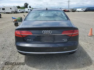 2015 Audi A8 4.0T z VIN WAU32AFD1FN012156, wystawiony jako Copart lot #52759185 z przebiegiem 117 498 mil mil oraz Szkody całkowita. Historia ofert i sprzedaży dostępna na DreamBid. Obrazek 6.