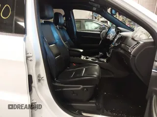 2021 Jeep Grand Cherokee 80th Anniversary with VIN 1C4RJFBG7MC611827, listed as a IAAI auction lot 41631740 with 85,253 mi miles and . Bid and sale history available at DreamBid. Image 5.