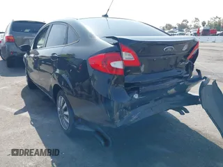 2011 Ford Fiesta SE with VIN 3FADP4BJ3BM122626, listed as a IAAI auction lot 42100151 with 109,287 mi miles and . Bid and sale history available at DreamBid. Image 3.