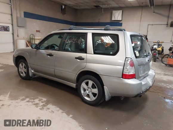 2006 Subaru Forester 2.5 X with VIN JF1SG636X6H712880, listed as a IAAI auction lot 40062211 with 127,537 mi miles. Bid and sale history available at carsss.com. Image 3.