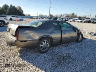 1999 Cadillac Eldorado Touring z VIN 1G6ET1299XU612153, wystawiony jako Copart lot #86257044 z przebiegiem Nie podano mil oraz Nie do naprawy. Historia ofert i sprzedaży dostępna na DreamBid. Obrazek 3.