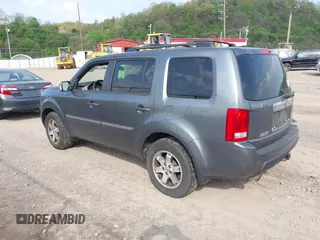 2011 Honda Pilot Touring with VIN 5FNYF4H90BB103824, listed as a IAAI auction lot 42127137 with 243,858 mi miles and . Bid and sale history available at carsss.com. Image 3.