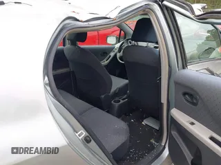 2010 Toyota Yaris with VIN JTDKT4K38A5296999, listed as a IAAI auction lot 41878127 with 122,692 mi miles. Bid and sale history available at carsss.com. Image 8.