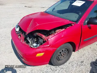 2000 Ford Focus LX with VIN 1FAFP33PXYW413249, listed as a IAAI auction lot 42561661 with 253,875 mi miles and . Bid and sale history available at DreamBid. Image 6.