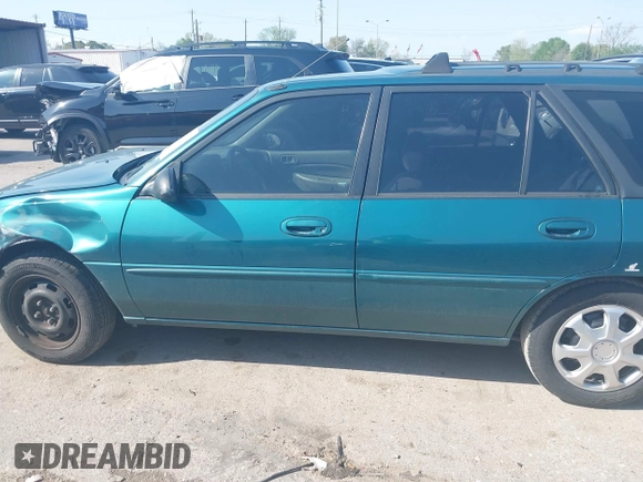 1997 Ford Escort LX z VIN 3FALP15P7VR158272, wystawiony jako IAAI lot #41833216 z przebiegiem 148 170 mil mil oraz . Historia ofert i sprzedaży dostępna na DreamBid. Obrazek 13.