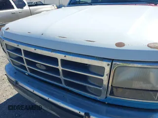 1995 Ford F-150 z VIN 1FTEX14H6SKB75447, wystawiony jako IAAI lot #40212118 z przebiegiem 205 880 mil mil oraz . Historia ofert i sprzedaży dostępna na DreamBid. Obrazek 6.
