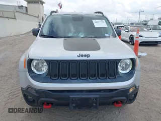 2017 Jeep Renegade Trailhawk with VIN ZACCJBCB6HPE63267, listed as a IAAI auction lot 42027156 with 64,899 mi miles and . Bid and sale history available at DreamBid. Image 12.