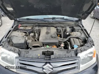 2013 Suzuki Grand Vitara Premium z VIN JS3TD0D65D4100272, wystawiony jako Copart lot #65140134 z przebiegiem 108 261 mil mil oraz Szkoda całkowita • Salvage title. Historia ofert i sprzedaży dostępna na DreamBid. Obrazek 14.