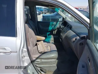 2004 Honda Odyssey EX-L with VIN 5FNRL18904B080009, listed as a IAAI auction lot 41736651 with 461,326 mi miles and . Bid and sale history available at DreamBid. Image 5.