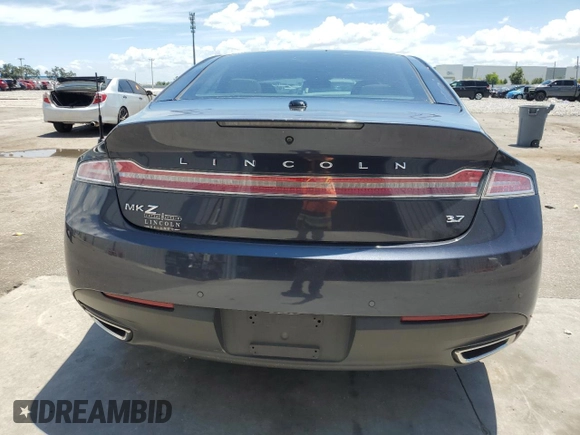 2013 Lincoln MKZ z VIN 3LN6L2GK4DR817557, wystawiony jako Copart lot #60876995 z przebiegiem 77 303 mil mil oraz Szkoda całkowita • Salvage title. Historia ofert i sprzedaży dostępna na DreamBid. Obrazek 6.