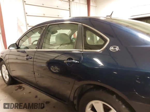 2007 Chevrolet Impala LT with VIN 2G1WT58K879156199, listed as a IAAI auction lot 41998450 with 124,511 mi miles and . Bid and sale history available at DreamBid. Image 14.