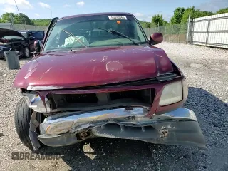 1999 Ford F-150 z VIN 1FTRX17W4XKB49075, wystawiony jako Copart lot #55340865 z przebiegiem Nie podano mil oraz Szkoda całkowita • Salvage title. Historia ofert i sprzedaży dostępna na DreamBid. Obrazek 13.
