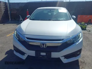 2016 Honda Civic EX-L with VIN 19XFC1F76GE200250, listed as a IAAI auction lot 42309545 with 91,589 mi miles and . Bid and sale history available at DreamBid. Image 12.