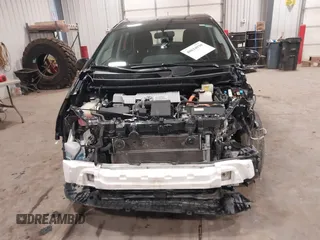 2017 Toyota Prius v Two with VIN JTDZN3EU0HJ063367, listed as a IAAI auction lot 40834930 with 153,045 mi miles. Bid and sale history available at carsss.com. Image 6.