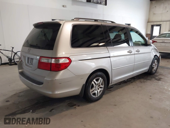 2006 Honda Odyssey EX-L z VIN 5FNRL38746B461357, wystawiony jako IAAI lot #41040746 z przebiegiem 256 047 mil mil oraz . Historia ofert i sprzedaży dostępna na DreamBid. Obrazek 4.