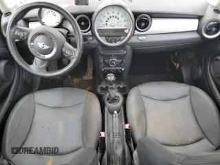 2011 MINI Hardtop with VIN WMWSU3C58BTX96968, listed as a Copart auction lot 62560915 with 88,616 mi miles and Salvage title. Bid and sale history available at DreamBid. Image 8.