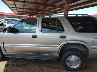 2001 GMC Jimmy SL with VIN 1GKCS13WX12222794, listed as a IAAI auction lot 41949569 with 169,961 mi miles. Bid and sale history available at carsss.com. Image 14.