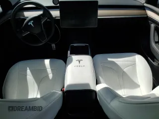 2023 Tesla Model 3 with VIN 5YJ3E1EA8PF648073, listed as a Copart auction lot 49284775 with 20,498 mi miles and Salvage Title. Bid and sale history available at DreamBid. Image 8.