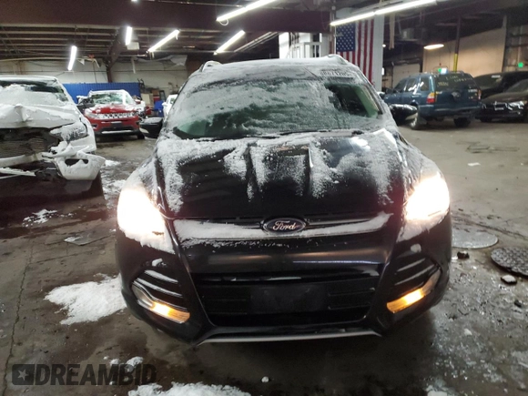 2015 Ford Escape Titanium with VIN 1FMCU0J91FUA41653, listed as a Copart auction lot 88871205 with 128,971 mi miles and Salvage Title. Bid and sale history available at DreamBid. Image 5.
