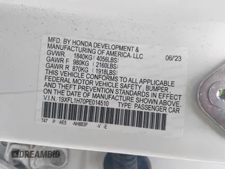 2023 Honda Civic EX-L with VIN 19XFL1H70PE014510, listed as a IAAI auction lot 42395890 with 14,163 mi miles and . Bid and sale history available at DreamBid. Image 9.