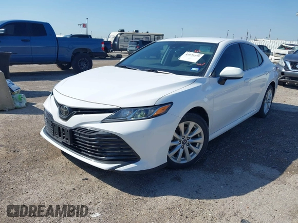2019 Toyota Camry LE with VIN 4T1B11HK9KU825107, listed as a IAAI auction lot 41971159 with 15,802 mi miles and . Bid and sale history available at DreamBid. Image 2.