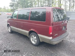 2003 Chevrolet Astro with VIN 1GNDM19X03B111420, listed as a IAAI auction lot 42210673 with 143,029 mi miles. Bid and sale history available at carsss.com. Image 3.