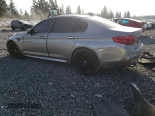 2018 BMW M5 z VIN WBSJF0C56JB282086, wystawiony jako Copart lot #37483454 z przebiegiem Nie podano mil oraz Szkoda całkowita • Salvage title. Historia ofert i sprzedaży dostępna na DreamBid. Obrazek 2.