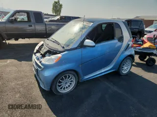 2013 Smart fortwo Passion с VIN WMEEJ9AA2DK722421, выставлен на аукционе Copart как лот 65154035 с пробегом 19 579 миль миль и Чистый • Clean title. История ставок и продаж доступна на DreamBid. Изображение 1.