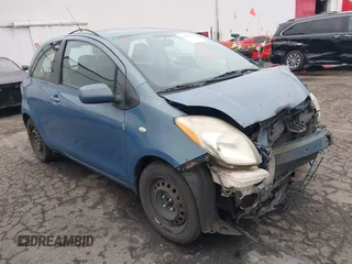 2007 Toyota Yaris z VIN JTDJT903375113576, wystawiony jako IAAI lot #41599408 z przebiegiem 192 543 mil mil oraz . Historia ofert i sprzedaży dostępna na DreamBid. Obrazek 1.